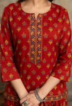 Red short kurti with floral skirt – close-up sequin embroidery neckline placket