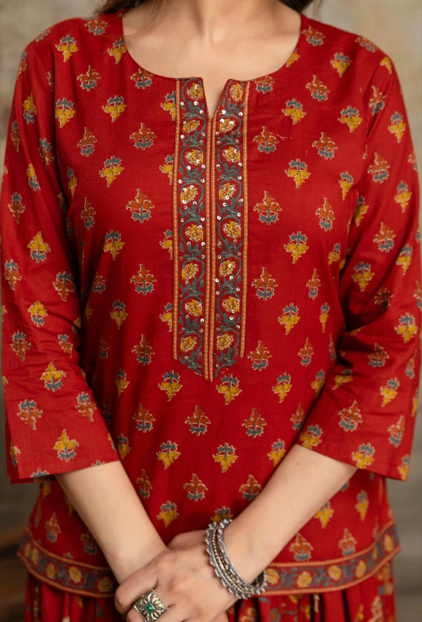 Red short kurti with floral skirt – close-up sequin embroidery neckline placket