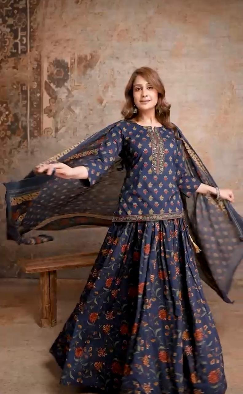 Navy blue short kurti with skirt – dupatta twirl pose