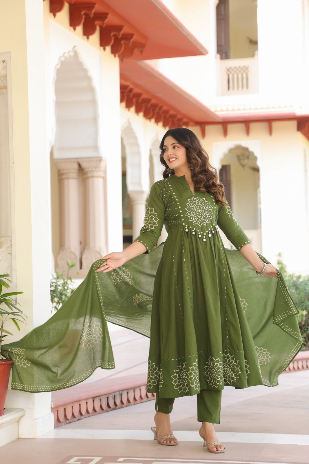 Wine Anarkali bandhani suit – full front standing view with dupatta draped over both arms