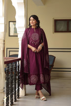 Wine Anarkali bandhani suit – full front standing view with dupatta held open showing mirror work border