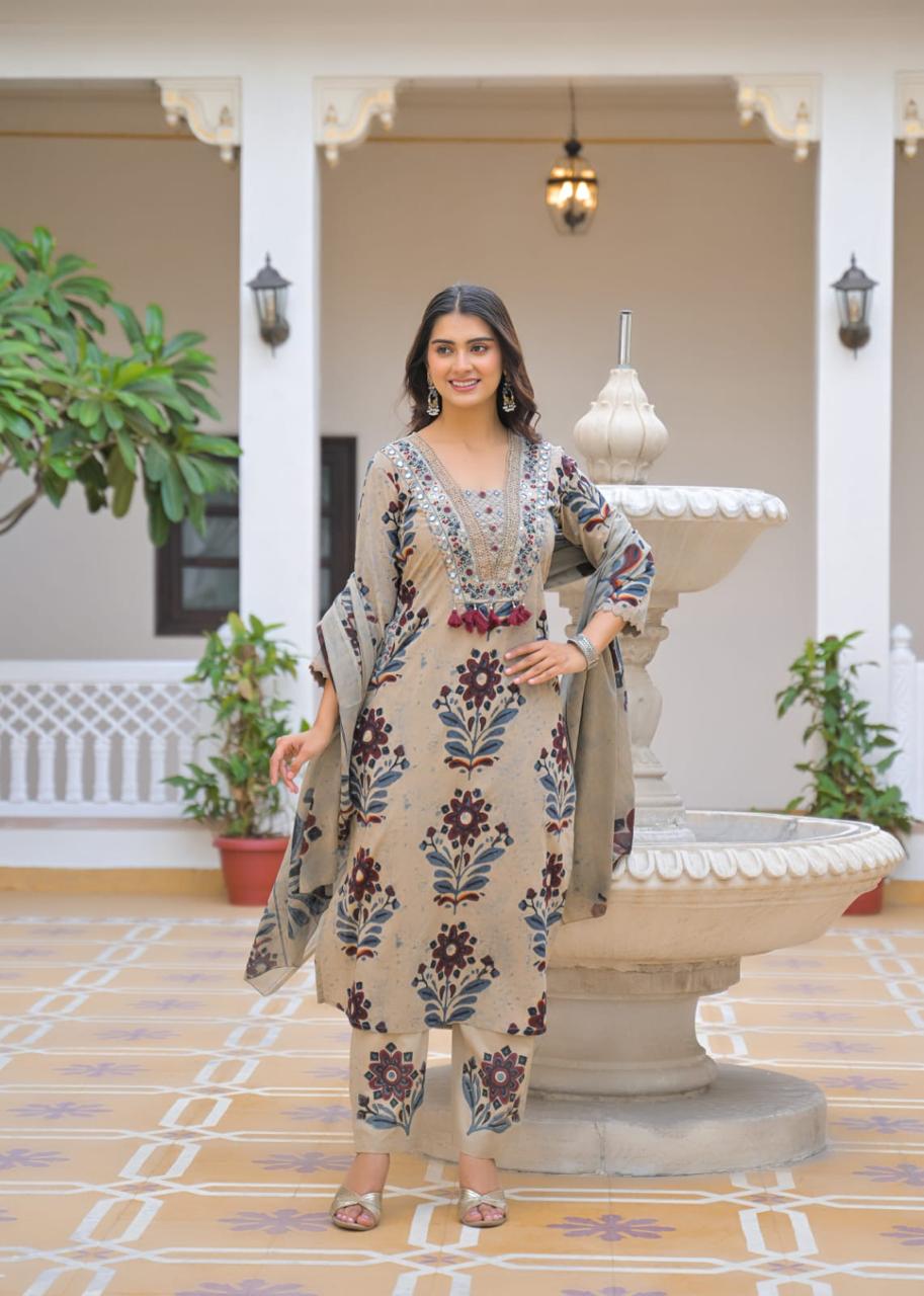 Beige brown ikat print suit – walking pose with dupatta drape