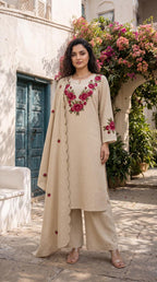Beige cream schiffli suit – lifestyle full front standing view with red rose embroidery neckline and scalloped hem