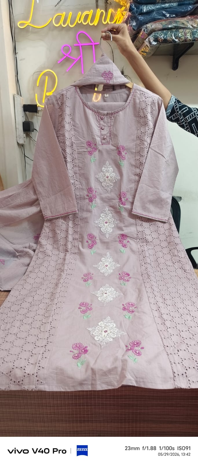 Beige cream schiffli suit – close-up red rose floral embroidery on V-neckline with scalloped border
