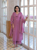 Mauve pink pure fabric suit – smiling full front standing view with dupatta draped open