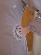 Mauve pink pure fabric suit – close-up neckline mirror embroidery and silk tassel detail
